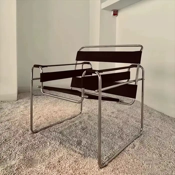 Fauteuil à bascule Bauhaus en acier tubulaire et cuir