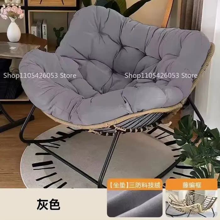 Fauteuil à bascule en rotin tressé