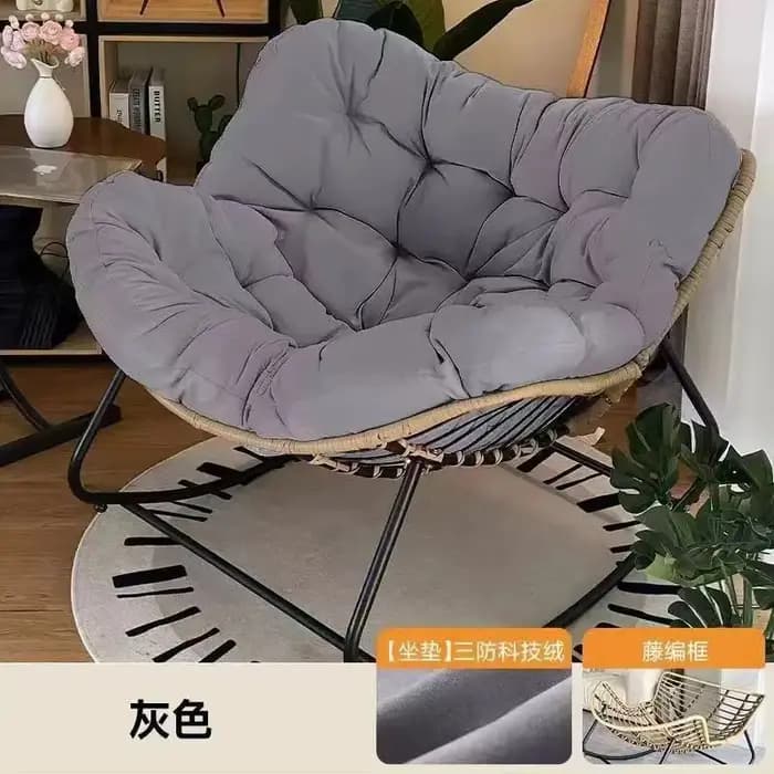 Fauteuil à bascule en rotin tressé