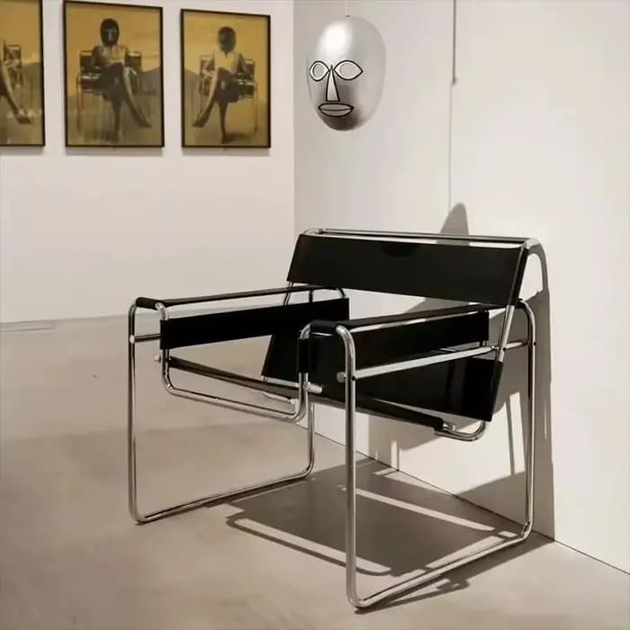Fauteuil à bascule Bauhaus en acier tubulaire et cuir
